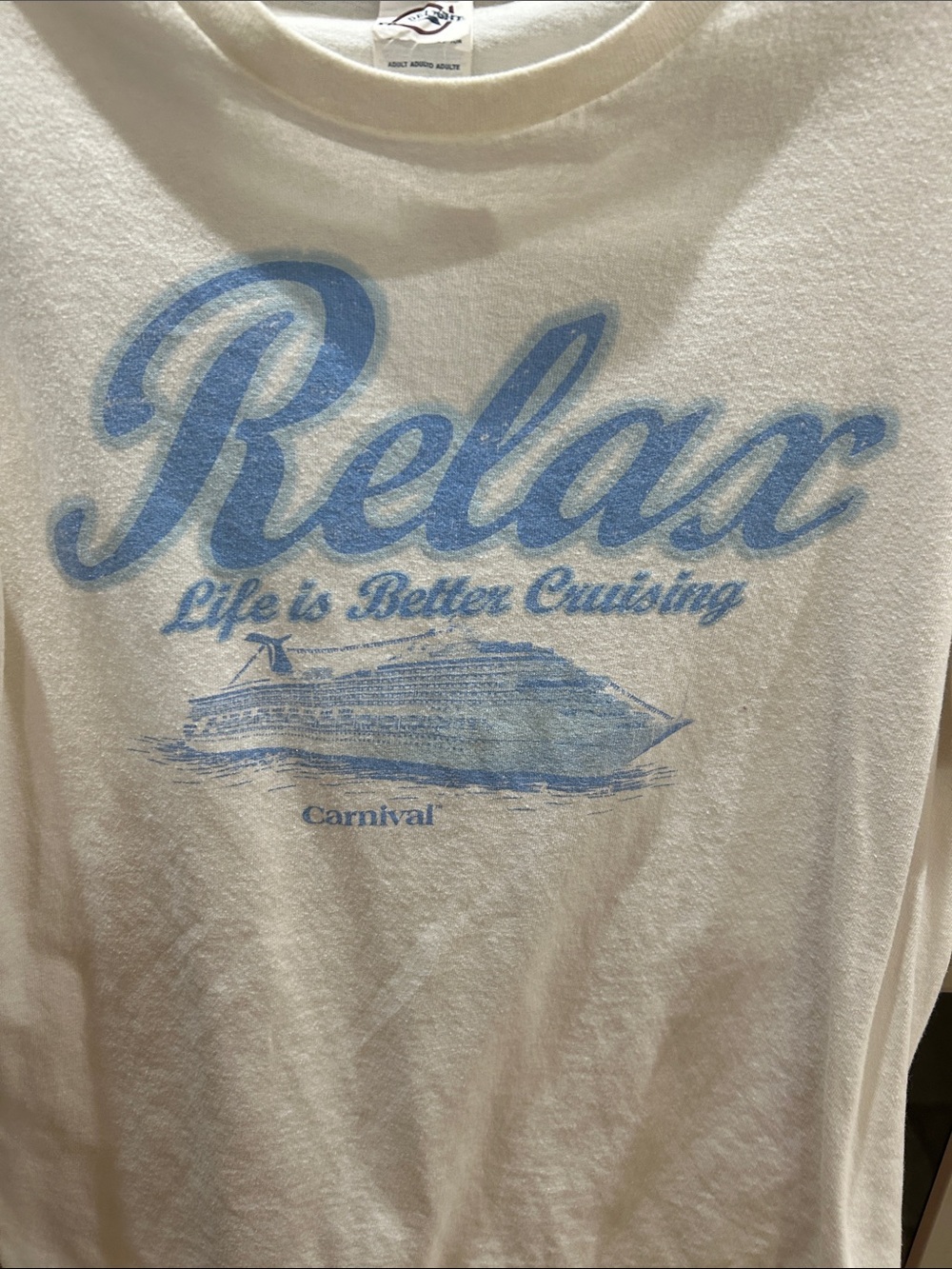 Delta White Short Sleeve Tee with Light Blue "Relax" Graphic